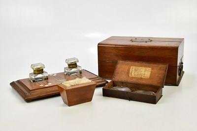 Lot 1538 - An early 20th century Arts & Crafts inlaid oak...