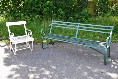 Lot 1450 - A green painted cast metal slatted garden...