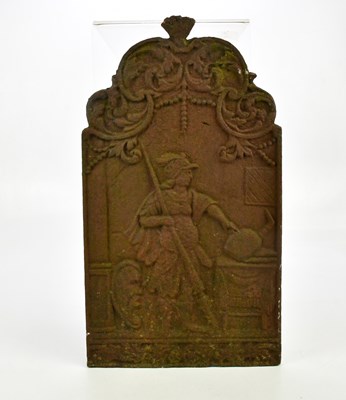 Lot 1455 - A cast iron fire back of shaped narrow form,...