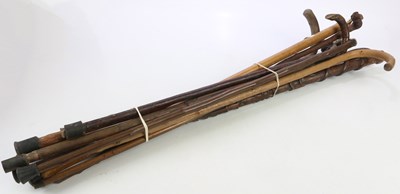 Lot 1599 - A small collection of walking sticks including...