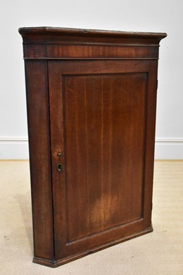 Lot 1394 - A Georgian oak straight front wall hanging...
