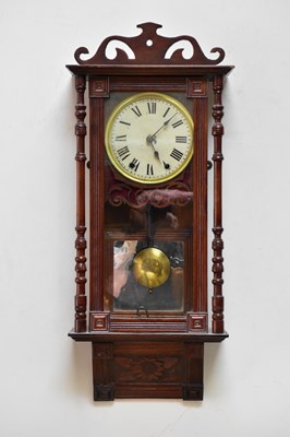 Lot 1421 - An early 20th century American wall clock, the...