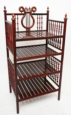 Lot 1745 - A reproduction mahogany music stand, with...