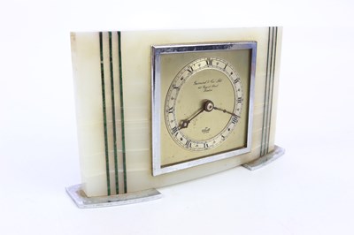 Lot 1441 - ELLIOTT; an Art Deco onyx cased mantel...