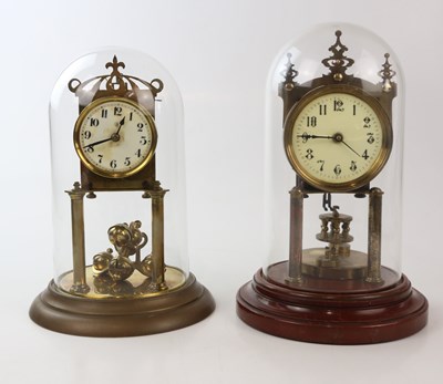 Lot 1440 - Two anniversary clocks, both with white enamel...