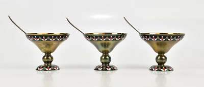 Lot 2435 - Three Russian silver gilt and enamel sundae...