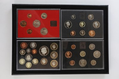 Lot 2651 - Four cased Royal Mint coin sets comprising...