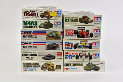 Lot 146 - TAMIYA; a collection of six model tank kits to...