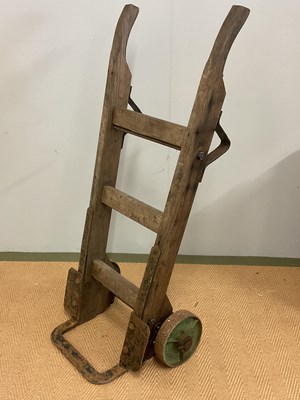 Lot 463 - A late 19th/early 20th century oak framed and...