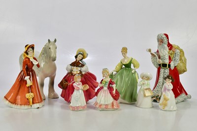 Lot 2532 - ROYAL DOULTON; a collection of eight figures...