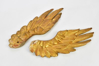 Lot 1606 - A pair of carved gilt angel wings, 40cm.