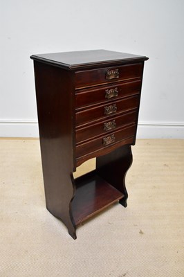 Lot 1287 - An Edwardian mahogany music cabinet, with five...