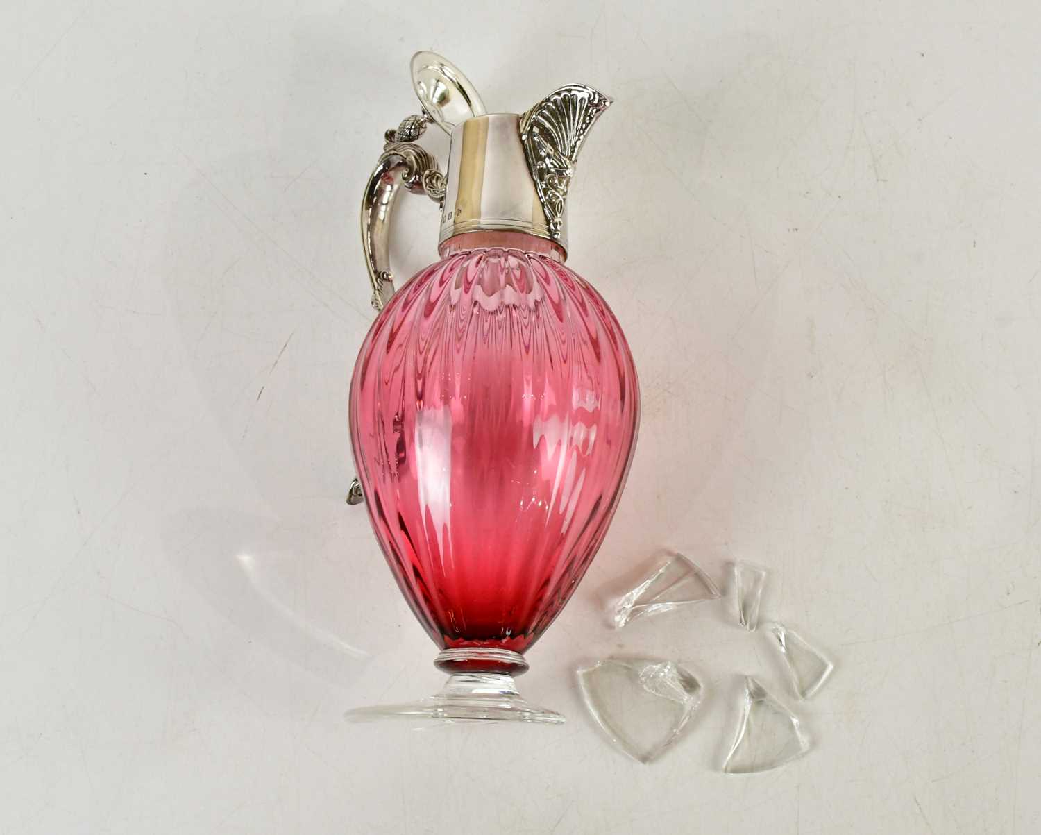 Lot 60 - A modern hallmarked silver mounted cranberry...