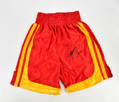 Lot 1832 - DOLPH LUNDGREN; a pair of red and yellow...