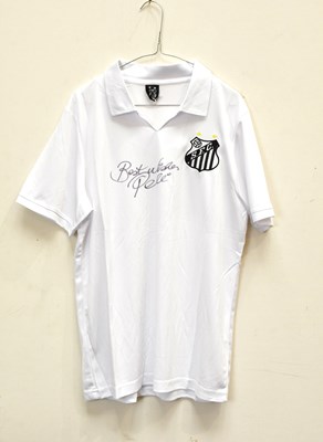 Lot 1821 - PELÉ; a signed Santos retro style football...