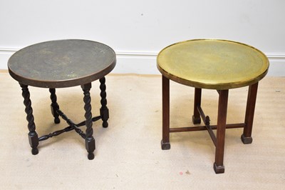 Lot 1730 - Two Eastern brass topped folding Benares tables.