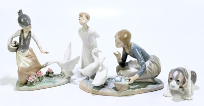 Lot 587 - LLADRO; four figures to include a girl feeding...