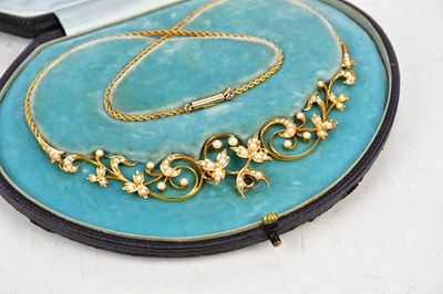 Lot 266 - An Edwardian 15ct yellow gold articulated seed...