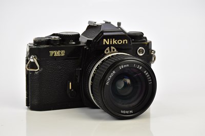 Lot 419 - NIKON; a Nikon FM2 35mm film camera, serial No...