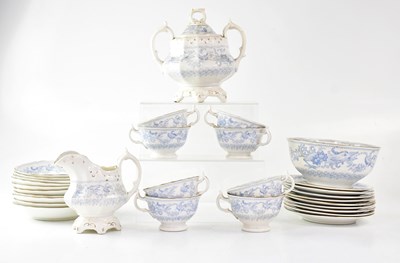 Lot 531 - A Chinese-style gilt-heightened blue and white...