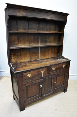 Lot 1365 - A late 18th/early 19th century oak dresser...