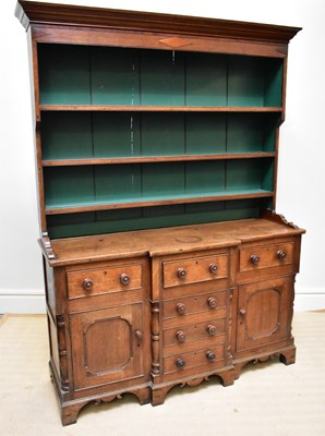Lot 1363 - A 19th century oak dresser, the boarded plate...