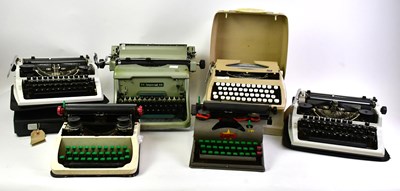 Lot 1568 - Eight assorted vintage typewriters including...