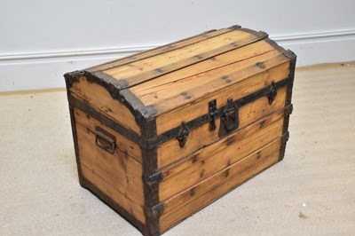 Lot 1310 - An old pine metal bound dome top trunk, width...