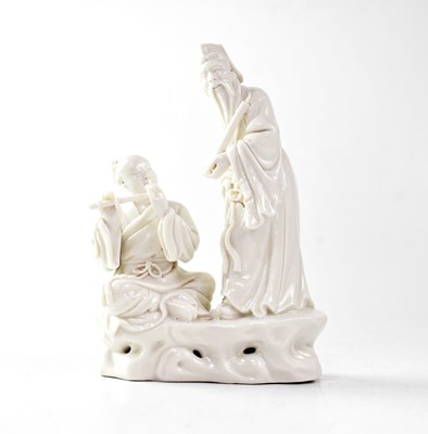 Lot 225 - A Chinese blanc de Chine figure group of a...