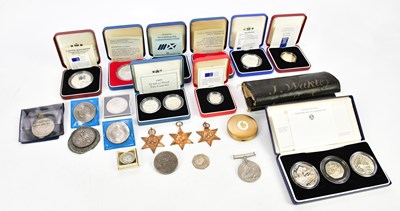 Lot 2676 - A small collection of coins to include a WWII...