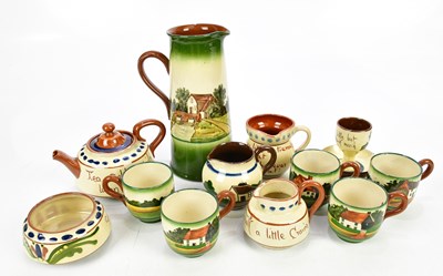 Lot 2928 - A small collection of Torquay Mottoware...