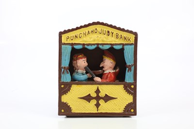 Lot 1617 - A cast iron Punch and Judy money box, height...