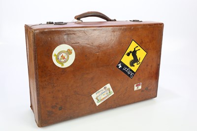 Lot 1569 - A vintage leather suitcase, width 55cm.