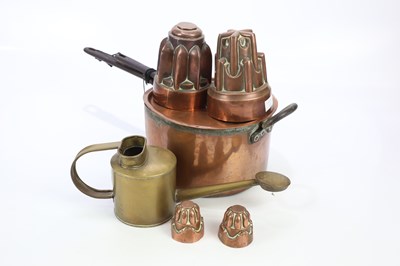 Lot 1723 - A 19th century large copper saucepan with lid,...