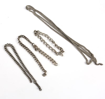 Lot 297 - A white metal chain, together with three...