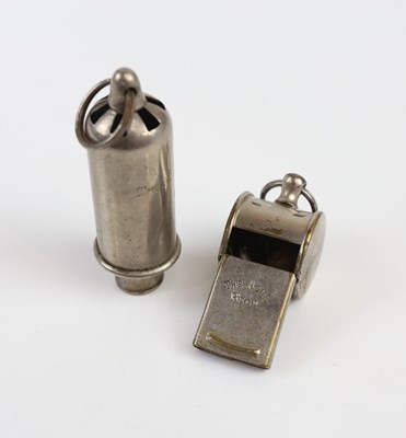 Lot 1635 - Two police whistles, one stamped 'The Acme...