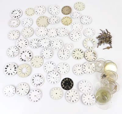 Lot 688 - A collection of various pocket watch faces,...