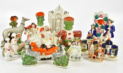 Lot 2881 - A collection of Staffordshire to include a...