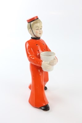Lot 2357 - A German Art Deco bell boy decanter, height 21cm.