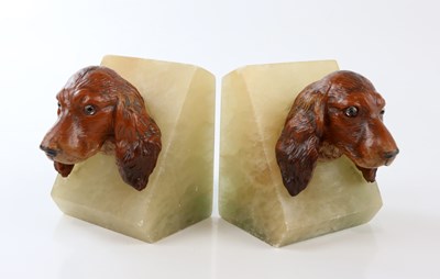 Lot 1714 - A pair of Art Deco patinated spelter and...