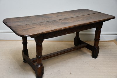 Lot 1145 - A 17th century oak refectory table, the...