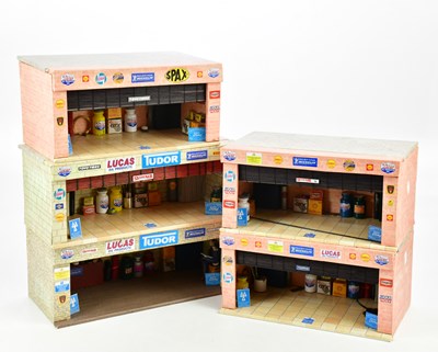 Lot 286 - A group of five plyboard car garage dioramas,...