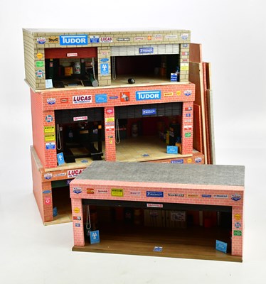 Lot 287 - A group of four plyboard car garage dioramas,...