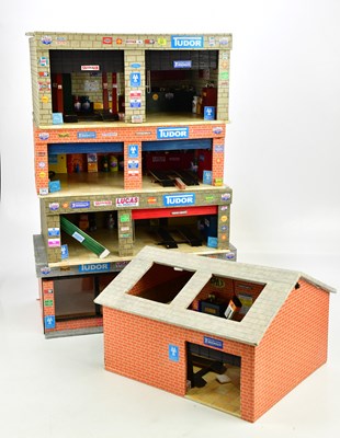 Lot 288 - A group of five plyboard car garage dioramas,...