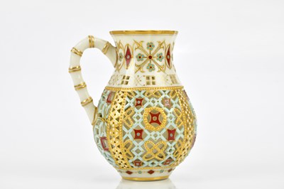 Lot 2413 - ROYAL WORCESTER; a reticulated baluster form...