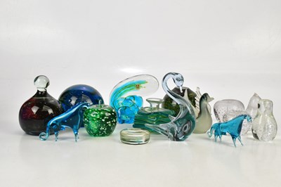 Lot 3012 - A collection of glass paperweights to include...