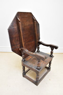 Lot 1373 - An 18th century and later oak monk's bench...