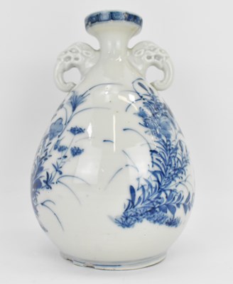 Lot 1097 - A 20th century Oriental pear-shaped vase with...