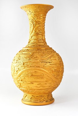 Lot 199 - A Japanese relief moulded vase, sprayed with...