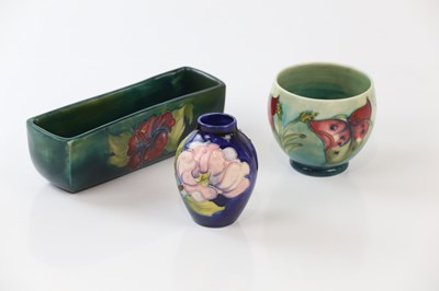 Lot 2361 - MOORCROFT; three pieces including a planter in...